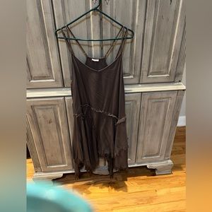 Free People dress with adjustable straps.  The color is taupe. Size M